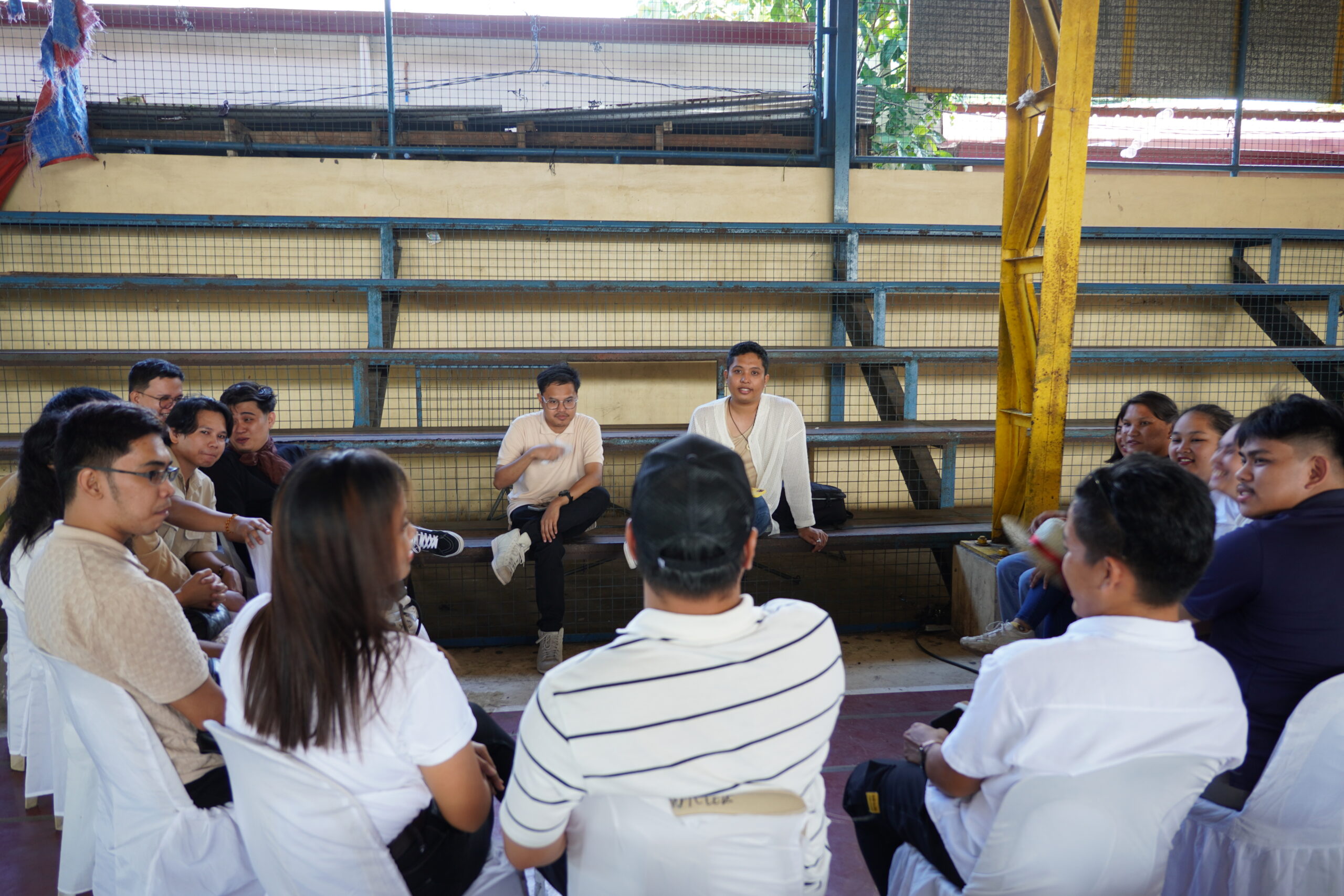 Young leaders engaged in discussion circle