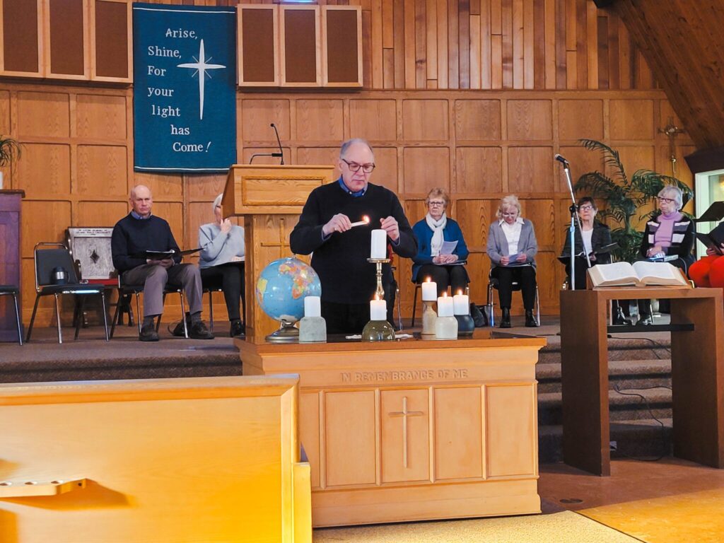Delegates at a Mennonite World Conference assembly listening and engaging